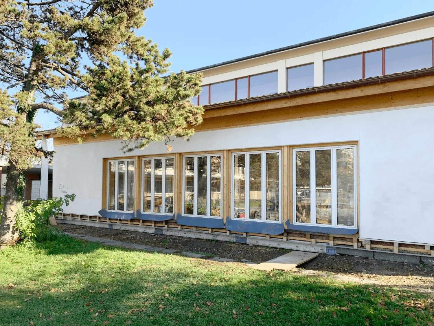 Photo du pavillon rebuilt et de la façade en enduit chaux